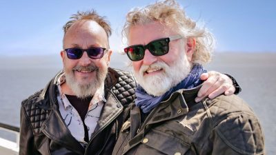 Dave Myers (left) and Sy King, as photographed by the BBC on the set of their latest series, "The Hairy Bikers Go West"